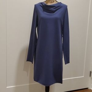 Gorgeous blue knit dress with unique details.